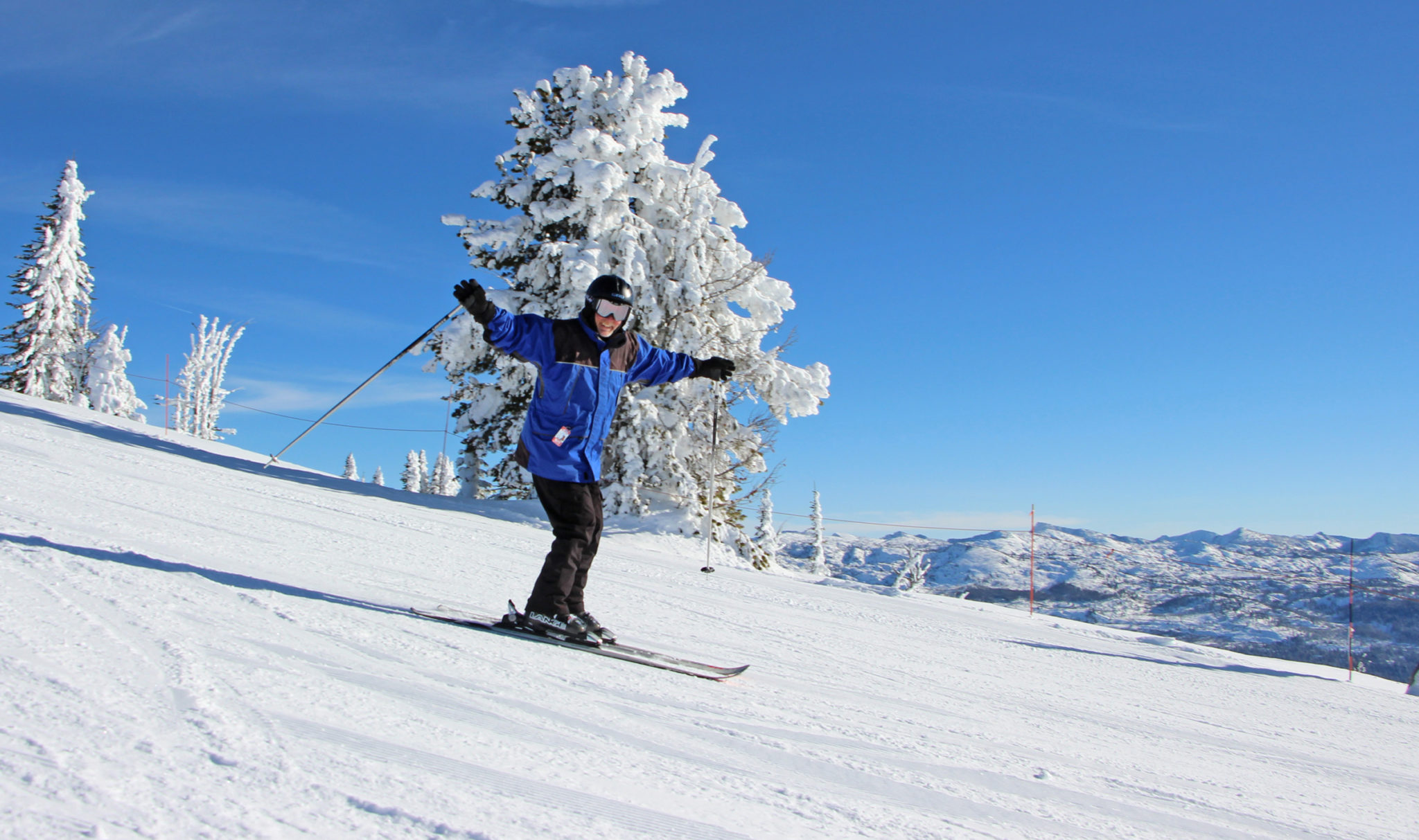 Happy skier heads toward Lakeview