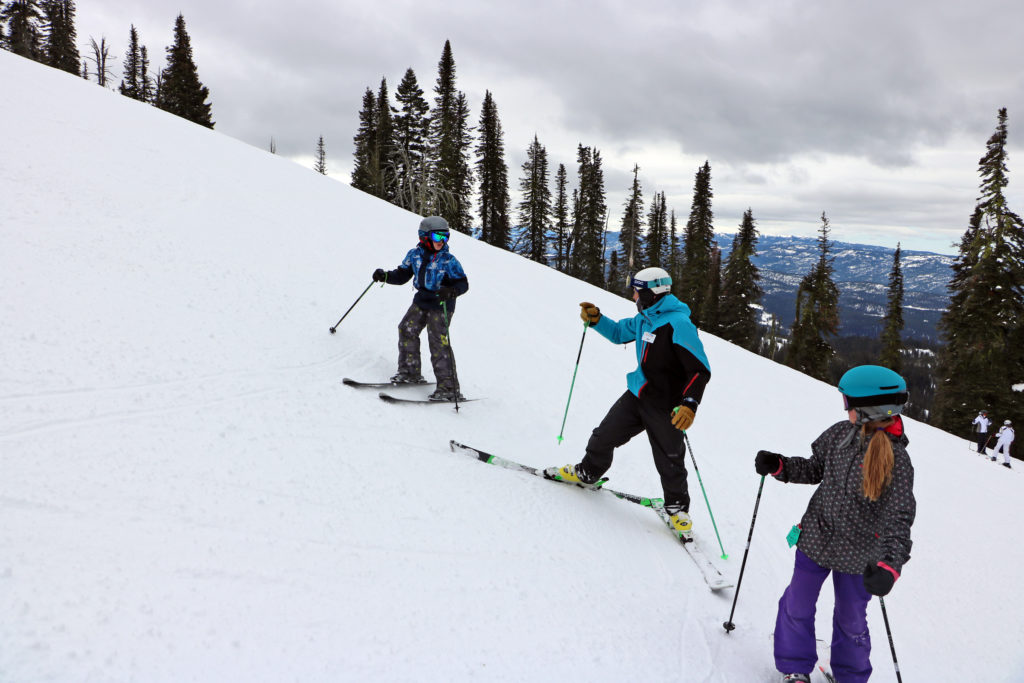 Ski lesson on upper mountain