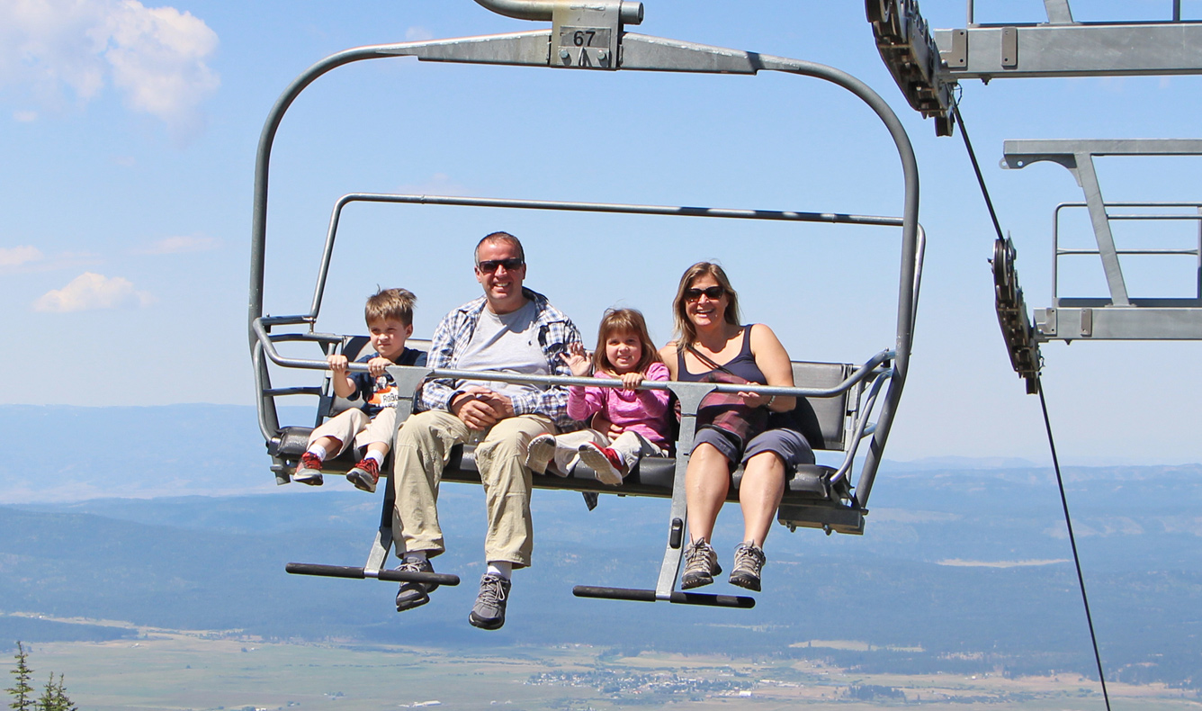 Family waves from chairlift