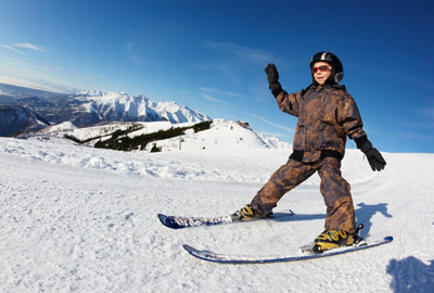 Winter powder snow accumulation in the mountains at Brundage showing cold weather conditions, fresh precipitation, frost, and perfect skiing terrain with flakes falling