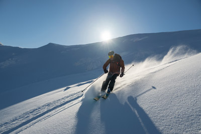 Mountain lodge at Brundage offering ski and snowboard rentals, lessons, gear, and vacation accommodations for winter adventure