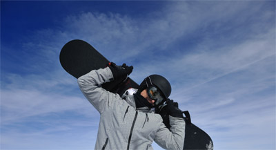 Sun Valley ski area at Bald Mountain with skiers and snowboard enthusiasts enjoying snowfall, lift tickets available for skiing and snowboarding adventures, lessons for beginner and kids, part of Idaho's premier ski resort region with variety of things to do